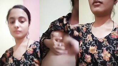 Desi girl showing her boobs in front of camera