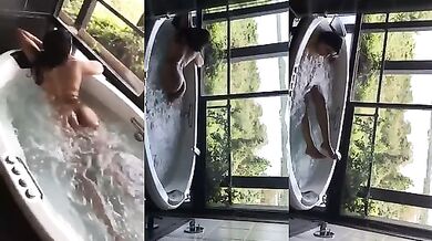 Modelling lady full nude tub bath